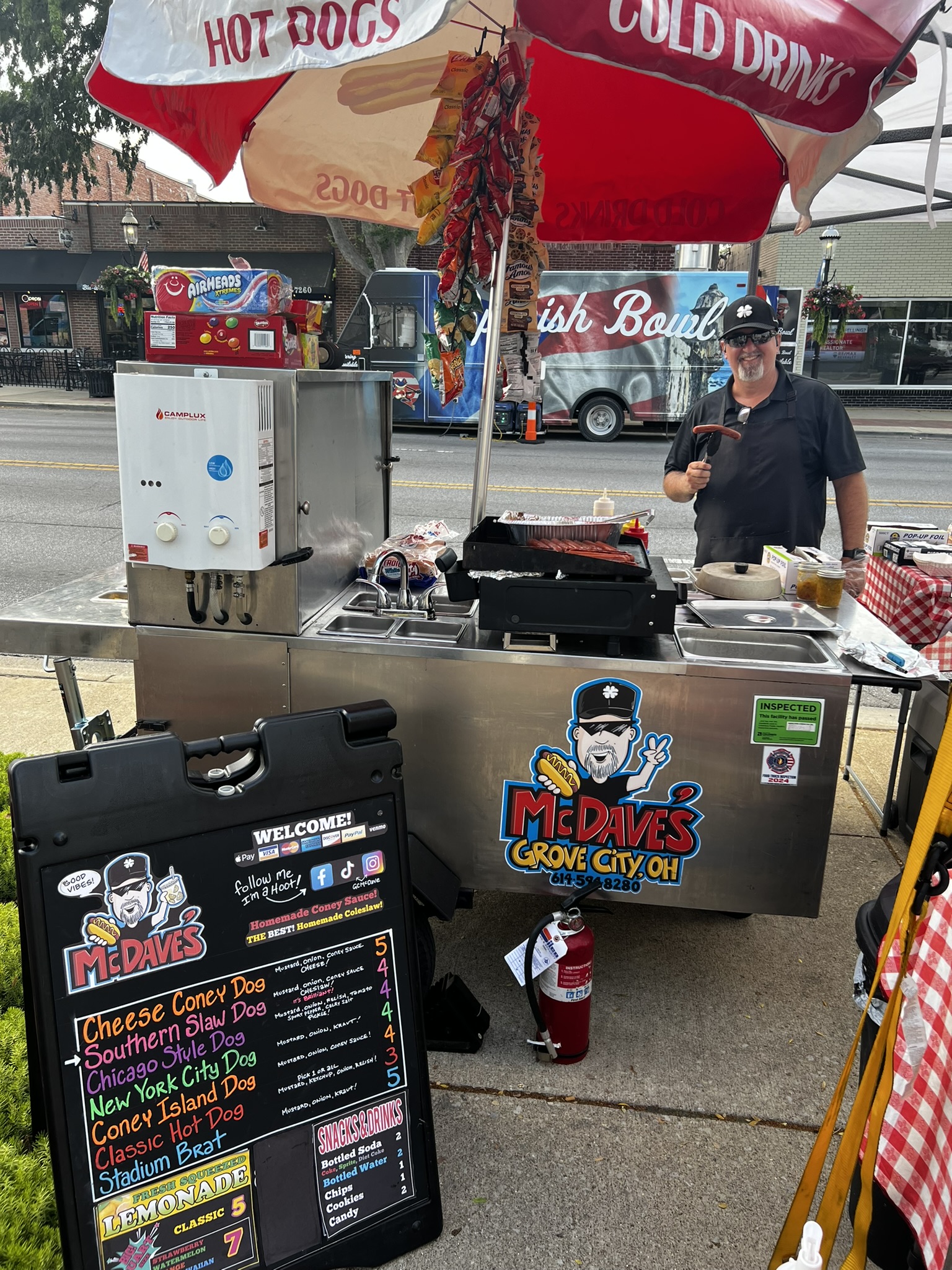 McDave’s hotdog cart setup on the street